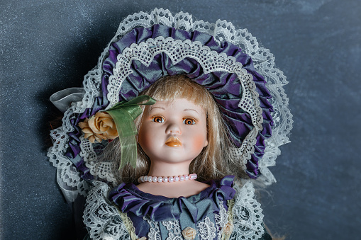 Beautiful folk girl. Handmade textile doll. Isolated on white