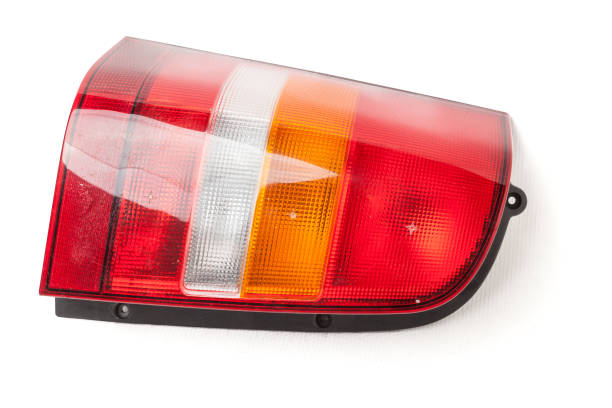 istock Close-up on an isolated generic rear light of a car on white background 1366385567