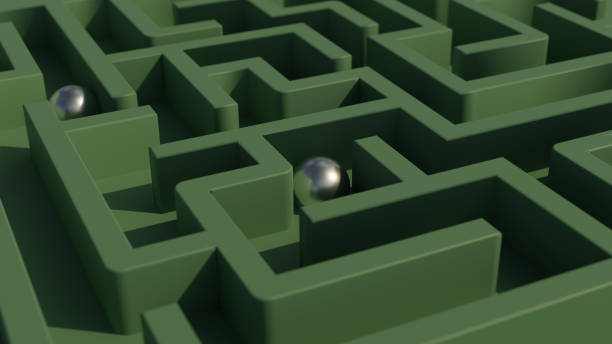 istock Steel balls inside maze. 1366390978