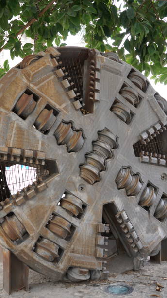 istock Tunnel boring machine, rotary cutting head in the foreground 1366391109