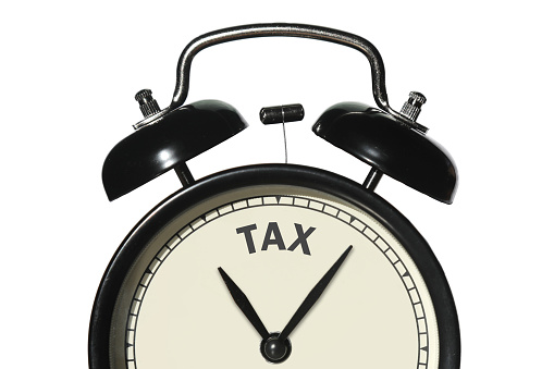 Tax time alarm clock reminder