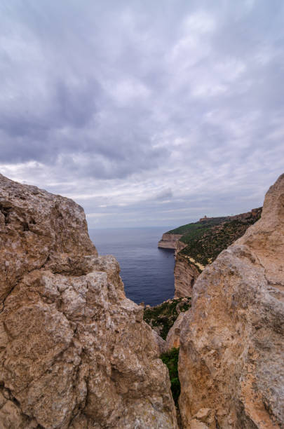 istock View on Dingli clifs through a rock, Malta 1366393287