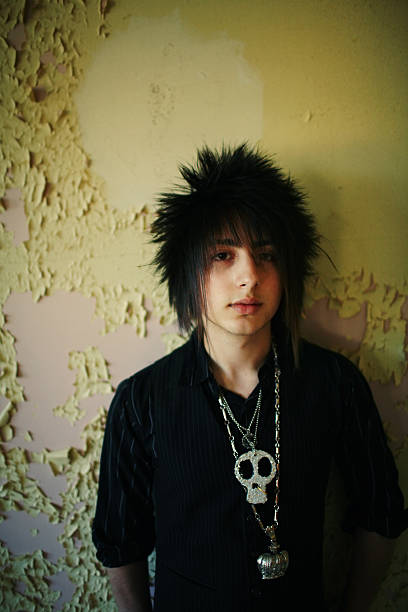 istock Young Scene Boy Against Aging Yellow Wall 136639577