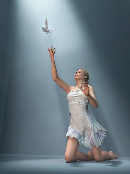 istock woman send white dove 136639586