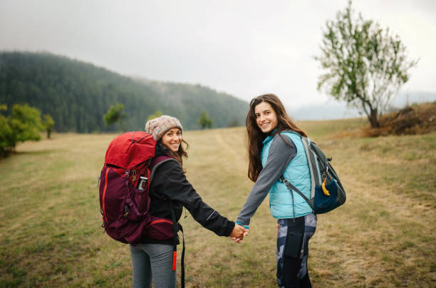 istock Two girls in the mountain. 1366396474