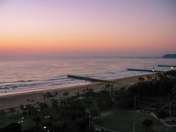 Sunrise over the Indian Ocean in the coastal city of Durban in KwaZulu Natal, South Africa stock photo