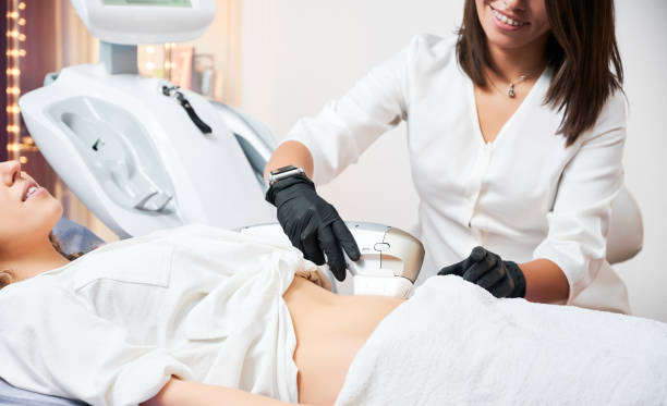 istock Doctor in white uniform doing ultrasound scan for patient. 1366398886