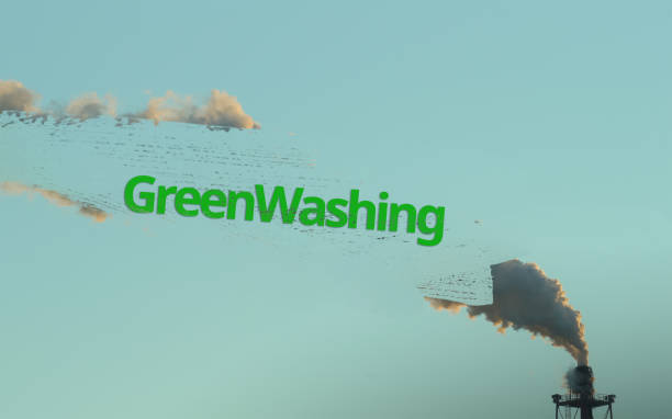 Greenwashing concept of an Industrial Plant damaging the environment stock photo