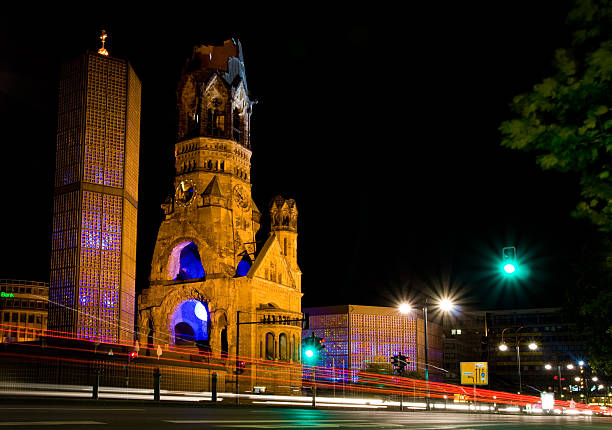 Berlin by night The Kaiser Wilhelm Memorial Church, Berlin's landmark by night kaiser wilhelm memorial church stock pictures, royalty-free photos & images