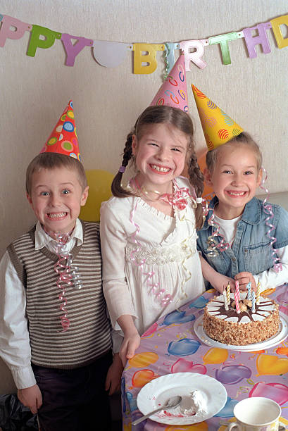 istock comic triple smile at child birthday 136640311