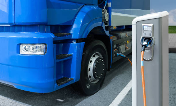 istock Electric truck with charging station 1366405659