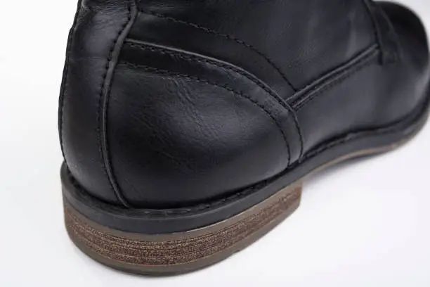 Closeup of male black Leather ankle shoes