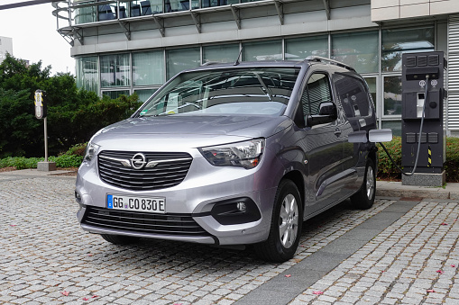Russelsheim, Germany - 15th October, 2021: Electric delivery van Opel Combo-e on a public charging point. This model is the smallest electric delivery van from Opel.