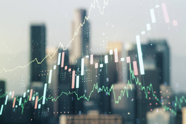 istock Abstract virtual financial graph hologram on blurry skyscrapers background, financial and trading concept. Multiexposure 1366412230