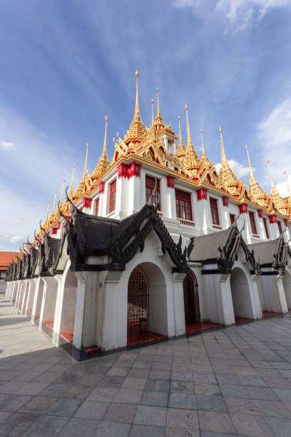 istock Wat Ratchanatdaram Temple in Bangkok, Thailand, with a blue sky in the background. 1366415190