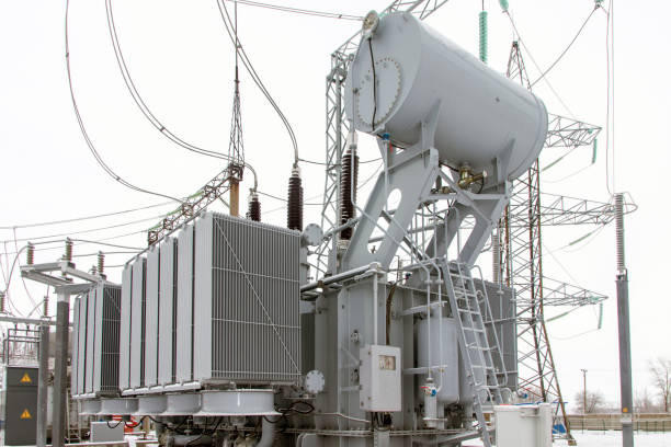 istock High voltage transformer, power plant in winter 1366420486