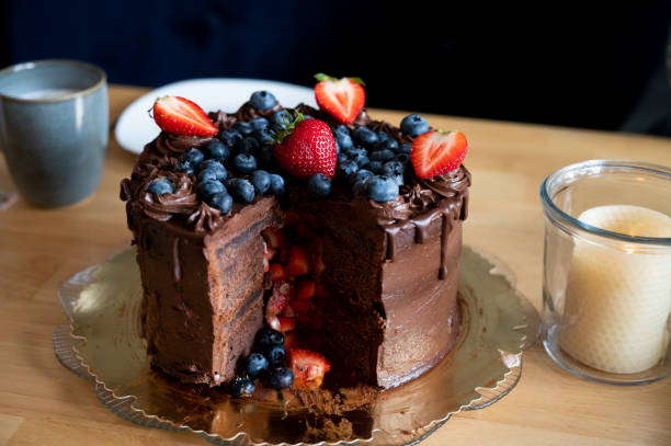 istock cut chocolate pinata cake filled with berries 1366420959
