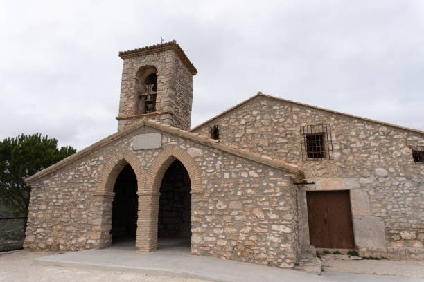 istock Hermitage in the mountain in a cloudy day 1366422955