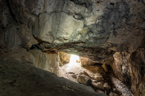 istock Rock formations inside a cave. Speleology and geology concept 1366422989