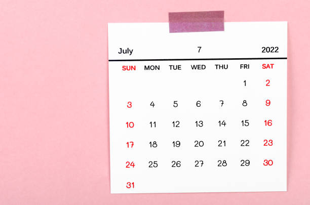 istock July 2022 calendar on pink background. 1366423672