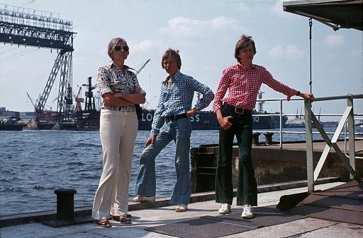 St. Pauli, Hamburg, Germany, 1977. Family waiting for the tour boat at the quay in the port of Hamburg.