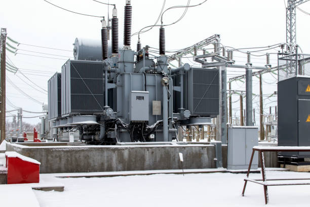istock High voltage transformer, power plant in winter 1366424438