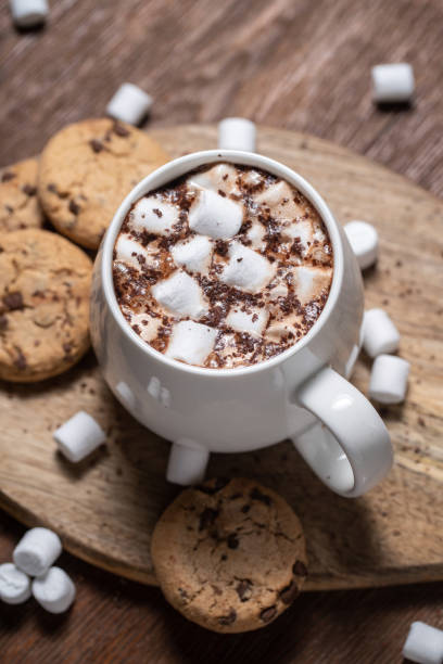 istock Mug of a fragrant hot chocolate/coffee with marshmallows and cookies 1366424671