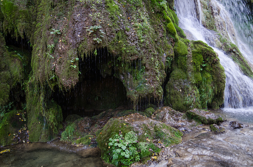 The beautiful turquoise Krushuna Waterfalls near town of Lovech, Bulgaria in summer