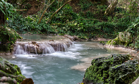 The beautiful turquoise Krushuna Waterfalls near town of Lovech, Bulgaria in summer