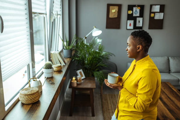 istock Happy young female relaxing at home. 1366427815