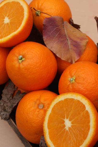 istock Oranges Fruit at Jus  Market Stall  Orange cut in half 1366427841
