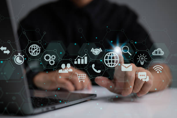 istock Businessman is using a digital vitual screen with laptop computer. The concept of global business. 1366428174