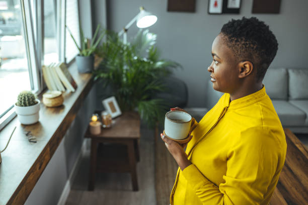 istock Happy young female relaxing at home. 1366429217