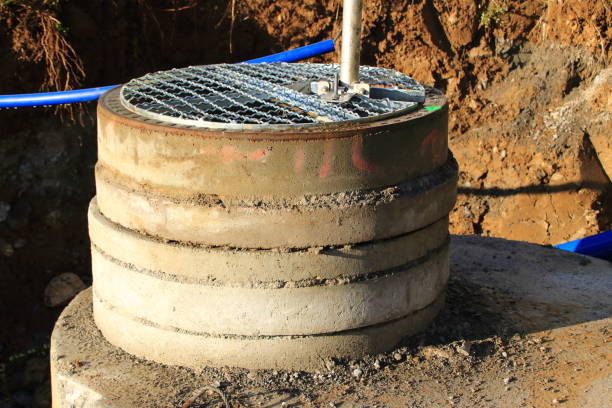istock Sewer shaft was adapted to the height with intermediate rings 1366432087