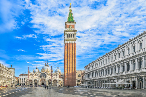 St. Mark's Square with St. Mark's Basilica and St. Mark's Tower in Venice in Italy