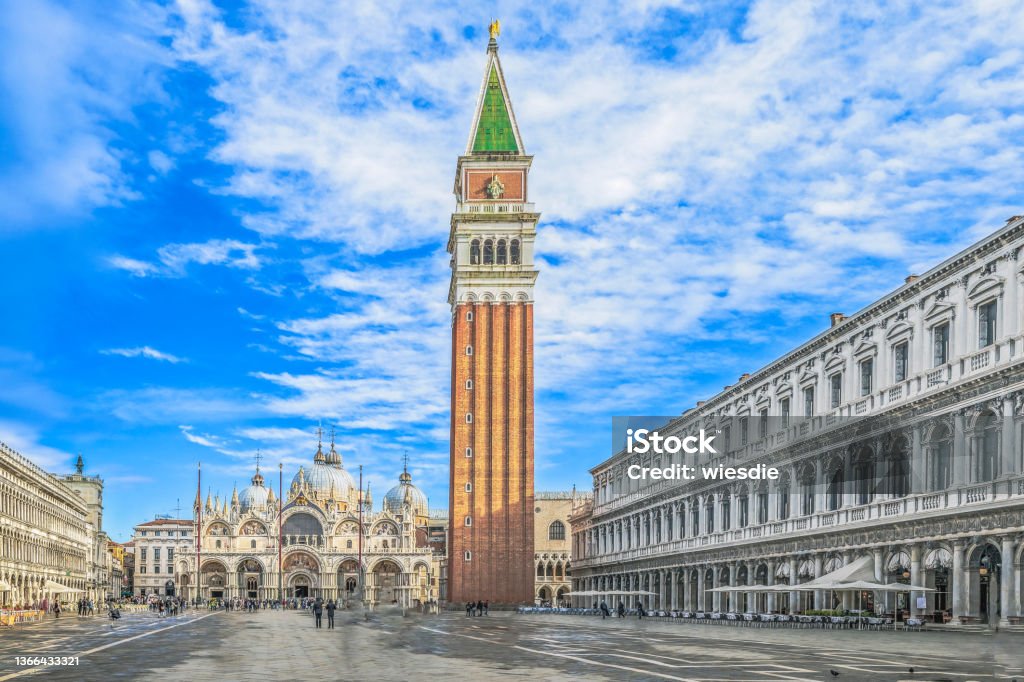 St. Mark's Square with St. Mark's Basilica and St. Mark's Tower in Venice in Italy St. Mark's Square with St. Mark's Basilica and St. Mark's Tower in Venice, Italy St. Mark's Square Stock Photo
