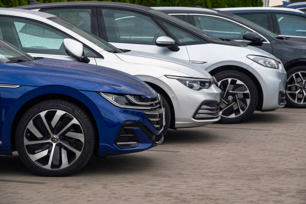 Berlin, Germany - 16th September, 2021: Volkswagen cars parked on a public parking. Volkswagen is a German motor vehicle manufacturer headquartered in Wolfsburg.