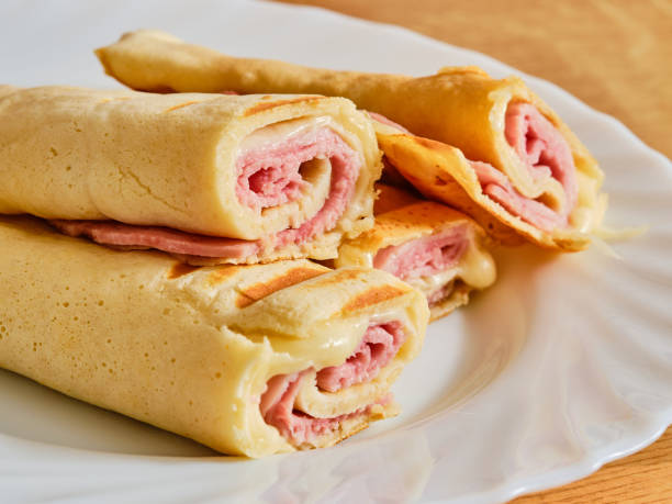 istock Pancakes with ham and cheese on plate 1366435824