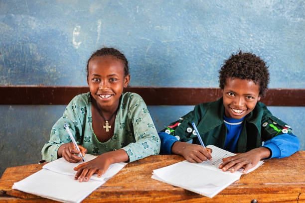 istock African children learning English language 1366438920