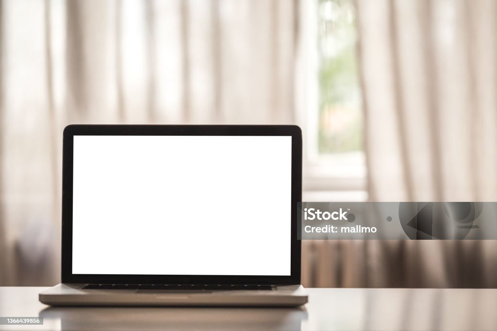 Laptop Withe Screen Laptop Computer White Screen On A Table With Window View Background ...