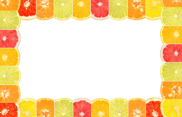 Frame from multicolored citrus fruits isolated on white background.