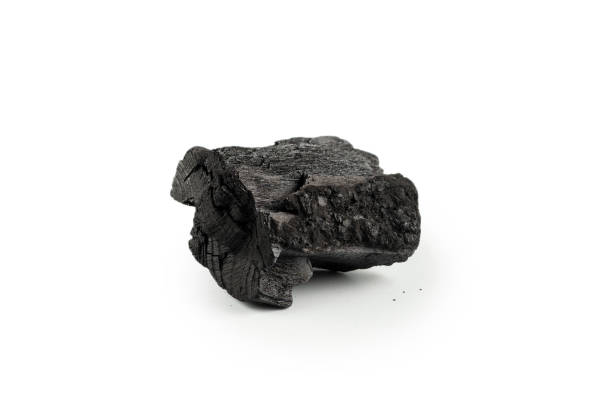 istock Black oak coal isolated on white background. 1366440245