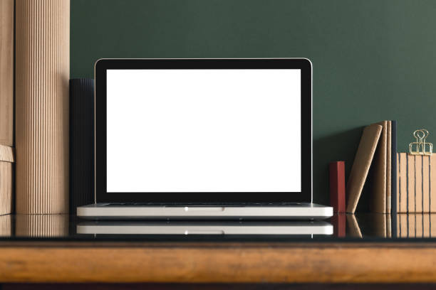 istock Mock up laptop at minimalist workspace vintage desk. 1366441902