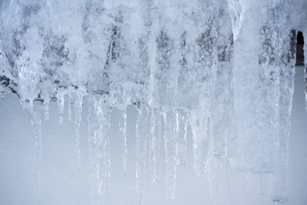 istock Ice candles on a roof during winter 1366442849