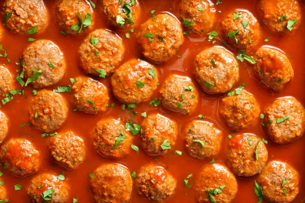 Close up view of meatballs with tomato sauce. Top view, flat lay