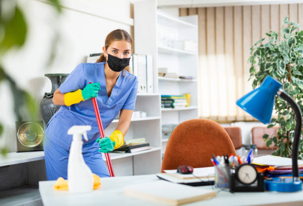 istock Woman cleaning floor with mop 1366449877