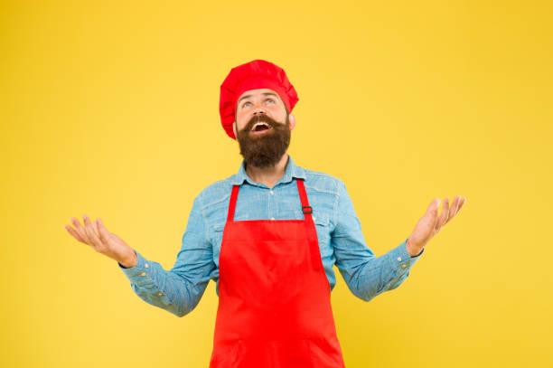 istock Every party begins with us. excellent cook or baker. special offer from chef. chef in restaurant kitchen. mature male chef. man cooking on kitchen. Professional chef man excited and happy 1366451036