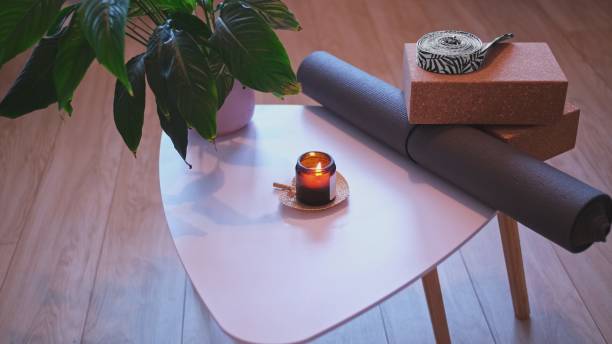 istock Yoga Studio Accessories Mat Candle Cork Blocks and Stretch Strap 1366452537