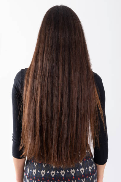 istock Beautiful straight, brown long hair, isolated on white. 1366454072