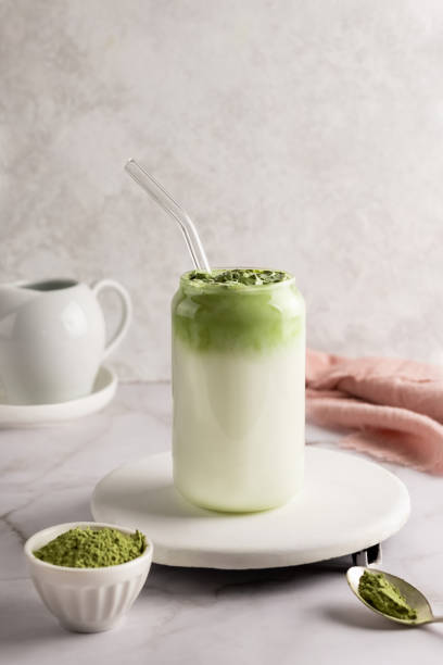 istock Dalgona matcha latte in glass, whipped grean tea with milk. 1366455613